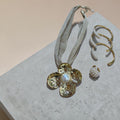Gold flower necklace